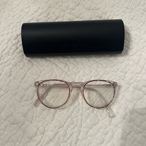 Clear Round Glasses with Case
Haskell in Crystal with Maple
Warby Parker